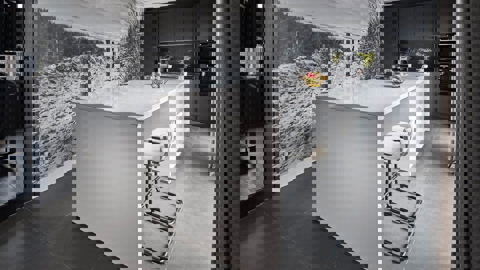 Moderne keuken met wit hoogglans eiland en fotowand Katwijk