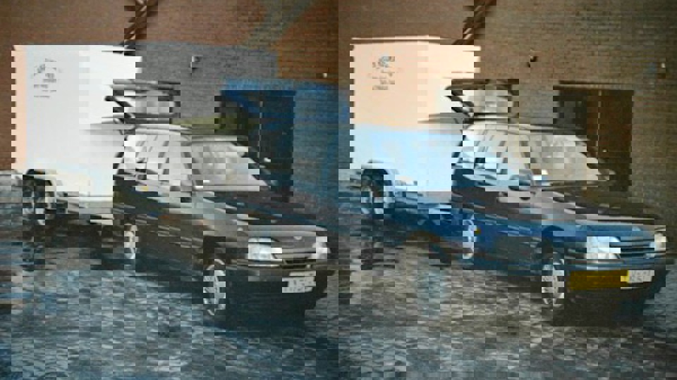 DB Keukens in 1991. Auto met aanhanger.